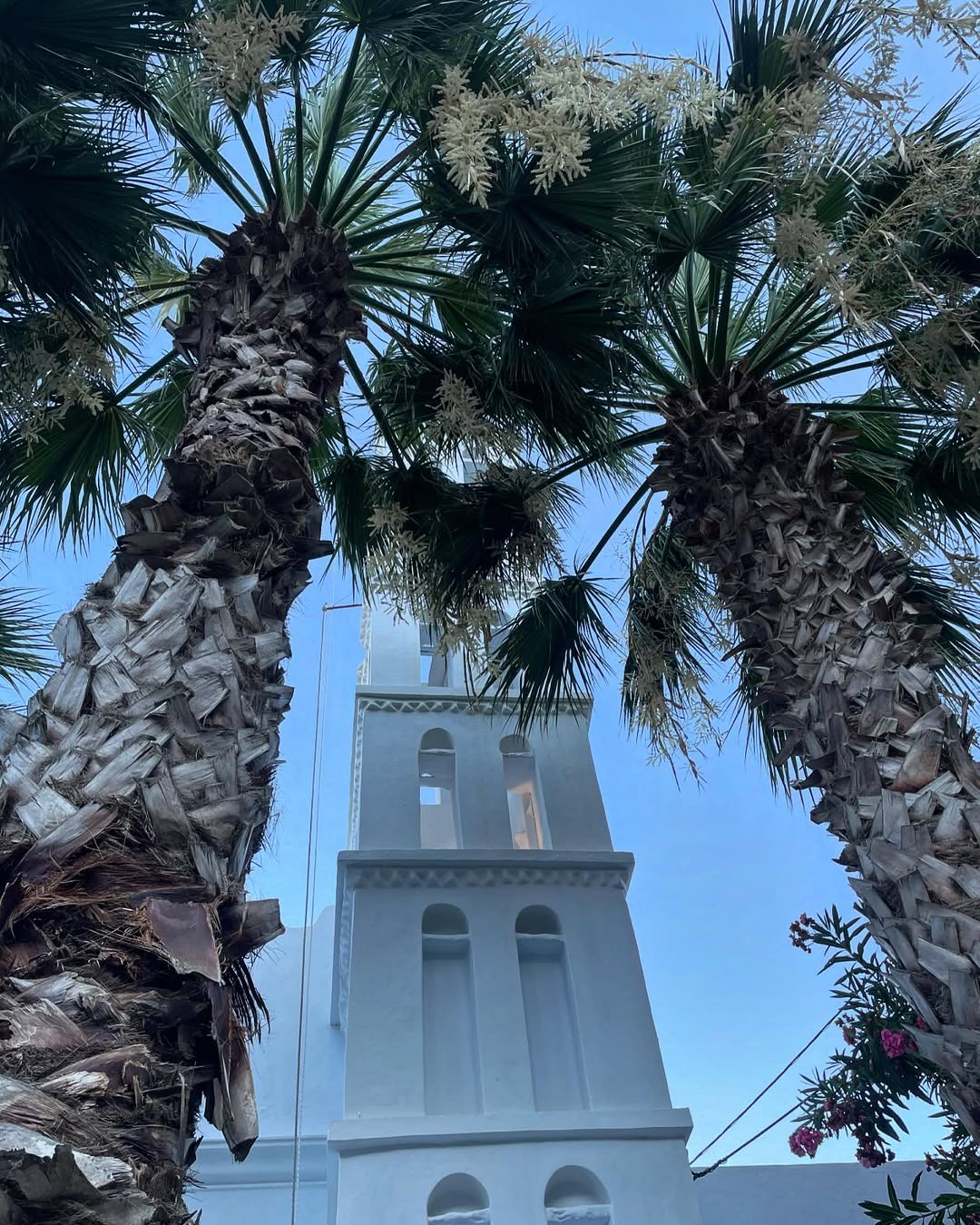 White bell towers & stone alleys